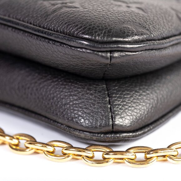 Authentic Louis Vuitton Black Monogram Empreinte Leather Liv Pochette - Picture 6 of 9
